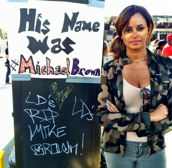 Claudia Jordan, co-host of the Rickey Smiley Morning Show at ground zero in Ferguson.