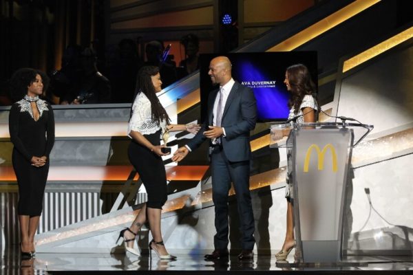 Hosted by Terrence &apos;J&apos; Jenkins and KeKe Palmer, the 12th annual 365Black Awards will premiere on BET Networks Sunday, August 23 at 9:00 p.m. EDT/8:00 p.m. CDT. Pictured, Academy award-nominated filmmaker, Ava DuVernay accepts award from actor/rapper, Common alongside actress, Salli Richardson Whitfield at the 12th annual 365Black Awards. (PRNewsFoto/McDonald&apos;s USA)