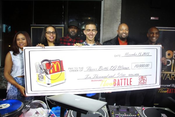Flavor Battle host and legendary DJ Clark Kent stands alongside the 2015 Flavor Battle winner, DJ Rhetorik of NewYork. at the finale at Orbit Nightclub during Global Spin Awards weekend. The sixth annual McDonald&apos;s Flavor Battle, a national online DJ competition, showcases some of America&apos;s hottest up-and-coming mix-masters. The competition began with 12 DJs representing three regions across the country (Pictured left to right: radio host, Angela Yee, Sprite Senior Customer Marketing Manager, Chrystal Reynolds, DJ Clark Kent, DJ Rhetorik, CEO of Powermoves Marketing & Promotions, Shawn Prez and McDonald&apos;s U.S. Marketing Director, William Rhodes. (PRNewsFoto/McDonald&apos;s USA)