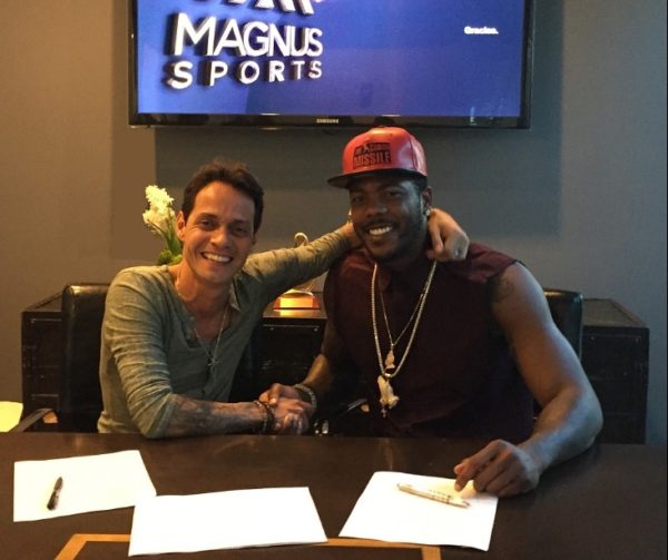 Marc Anthony and Aroldis Chapman at Magnus Media and Magnus Sports headquarters in Miami during 360 deal signing (Photo credit: Magnus Media) (PRNewsFoto/MAGNUS Media)