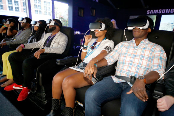"AUSTIN, TX - MARCH 12: Festival goers experience Samsung Gear VR at The Samsung Studio at SXSW 2016 on March 12, 2016 in Austin, Texas. (Photo by Rick Kern/Getty Images for Samsung)"