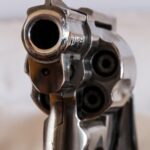 pexel gun scaled » Arrested